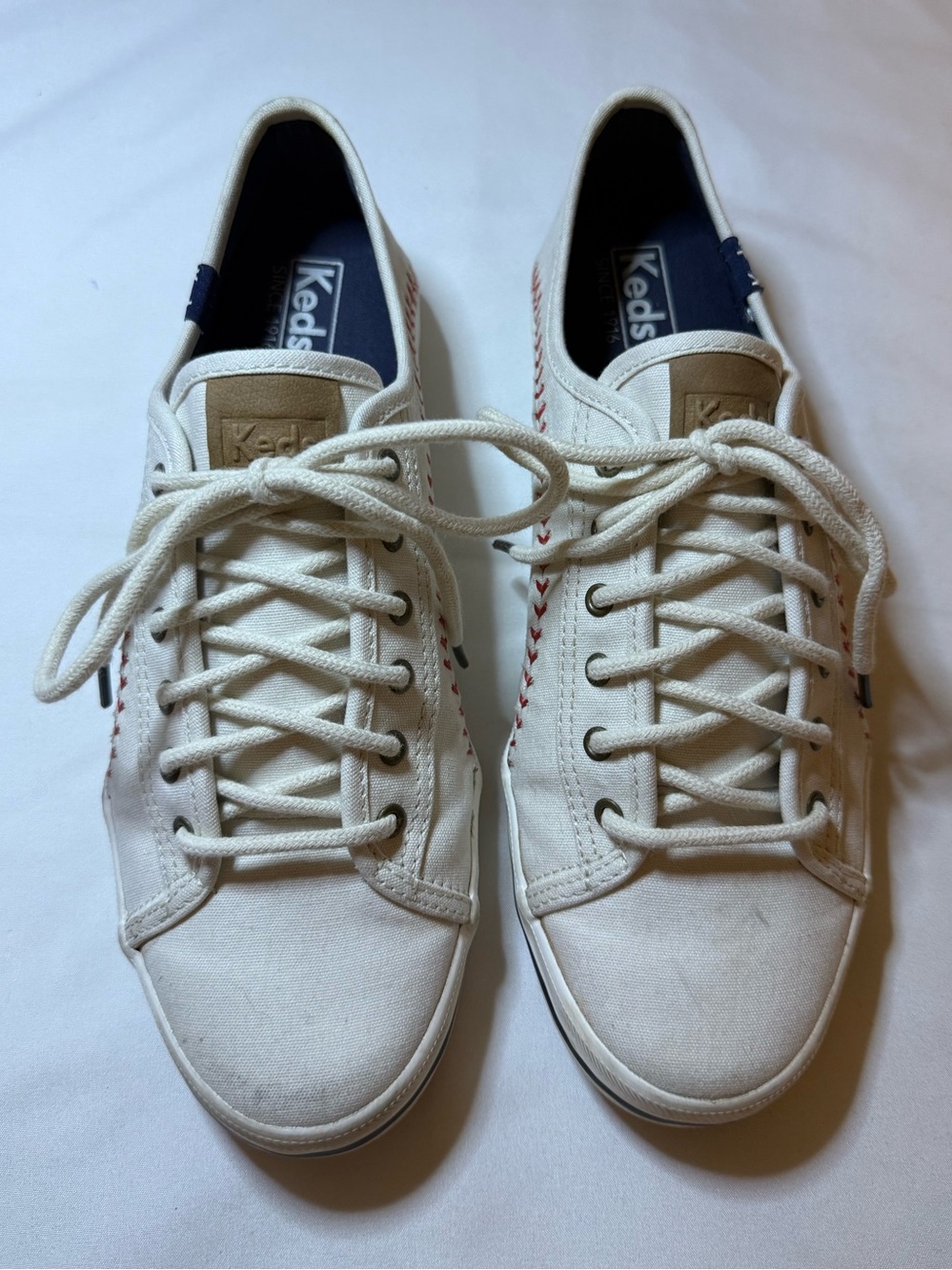 Keds Men's Off-White Canvas Sneakers with Navy and Red Accents